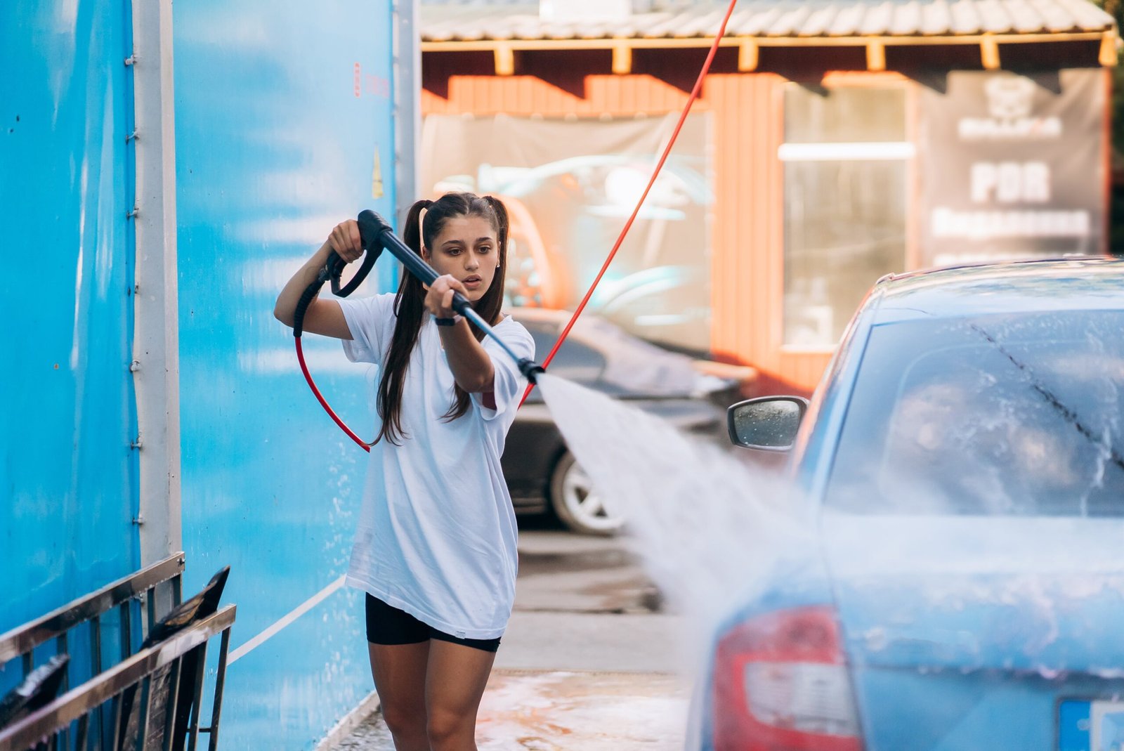 brunette-from-a-high-pressure-hose-washes-the-car-2024-11-01-02-08-15-utc-min